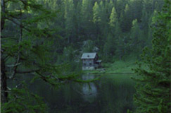 Landschaftsfoto Bergsee mit Hütte